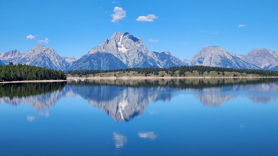 Kathryn Maietta, MSW, LCSW opening image webpage image of the Grand Tetons reflecting off a lake.